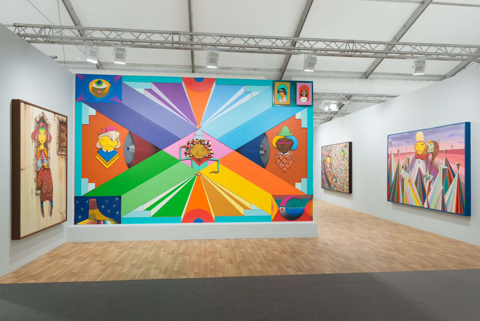 View of Lehmann Maupin's art fair booth at Frieze London 2018 featuring OSGEMEOS, perspective 2