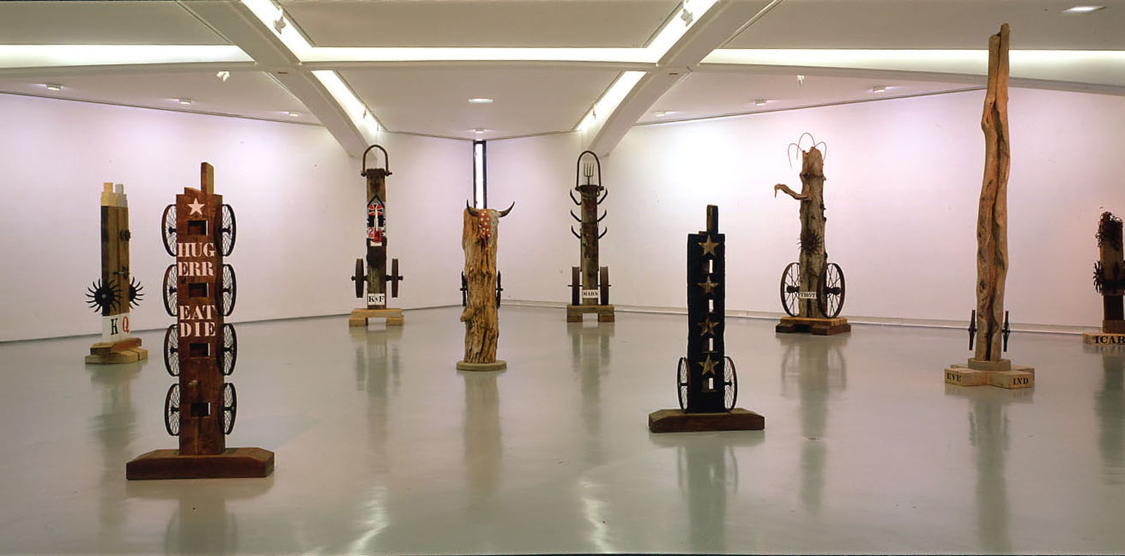 Installation view of the exhibition Robert Indiana: R&amp;eacute;trospective, 1958&amp;ndash;1998 at the Mus&amp;eacute;e d&amp;rsquo;Art Moderne et d&amp;rsquo;Art Contemporain in Nice, France; left to right: Monarchy (1981), The American Dream (1992), KvF (1991), USA (1996), Mars (1990), Four Star (1993), Thoth (1985), Eve (1997), and Icarus (1992)