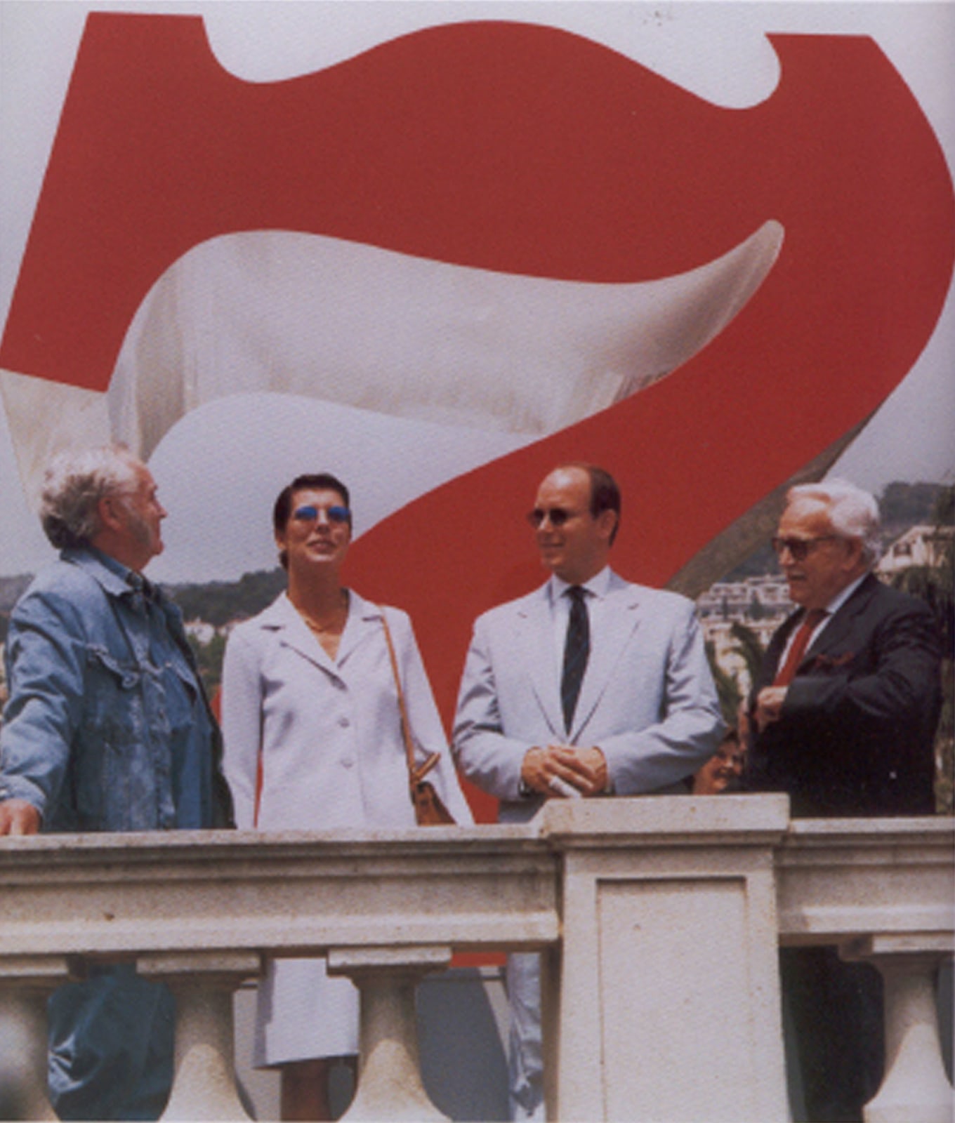 Left to right: Indiana, Princess Stephanie of Monaco, Prince Albert II of Monaco, and Prince Rainier III of Monaco, in front of Indiana&amp;rsquo;s sculpture Seven (1980) in Monte Carlo, 1997. Image courtesy of Star of Hope Foundation, Vinalhaven, Maine