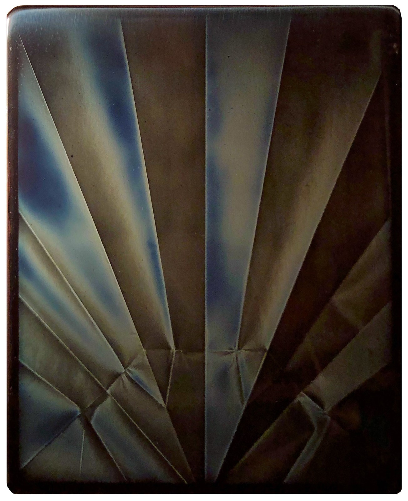 A solarized print with geometric folds