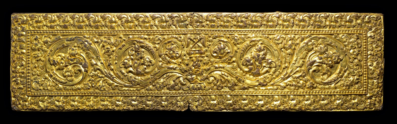 This manuscript cover is a masterpiece of early repoussé work.