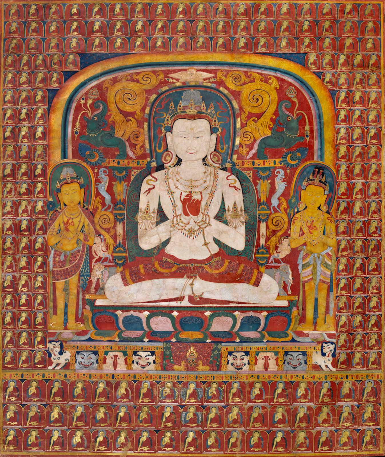 This superbly-painted thangka depicts Vairocana seated in the gesture of Supreme Wisdom