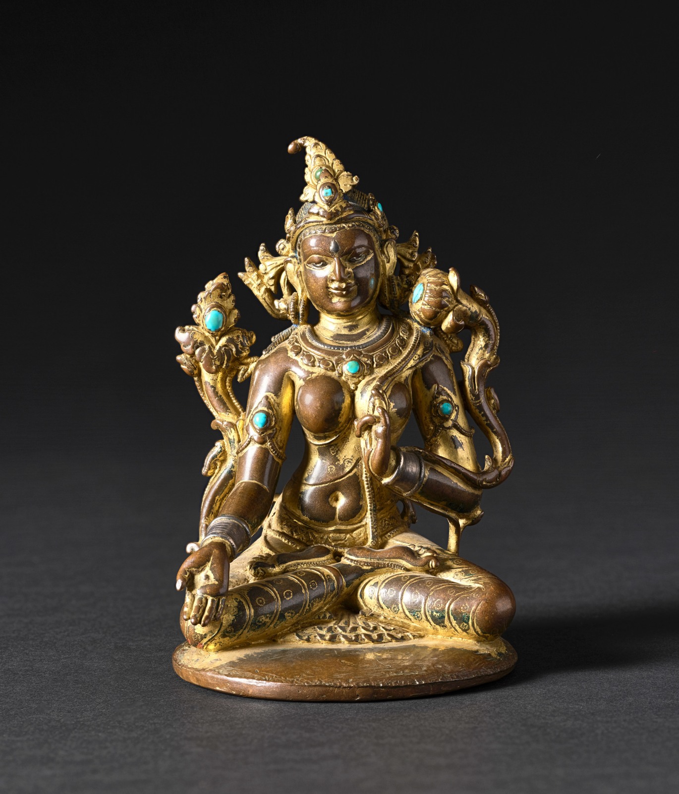 Same Photo of a gilt-bronze sculpture of the goddess "White Tara,” worshipped by Buddhists as bestower of longevity.