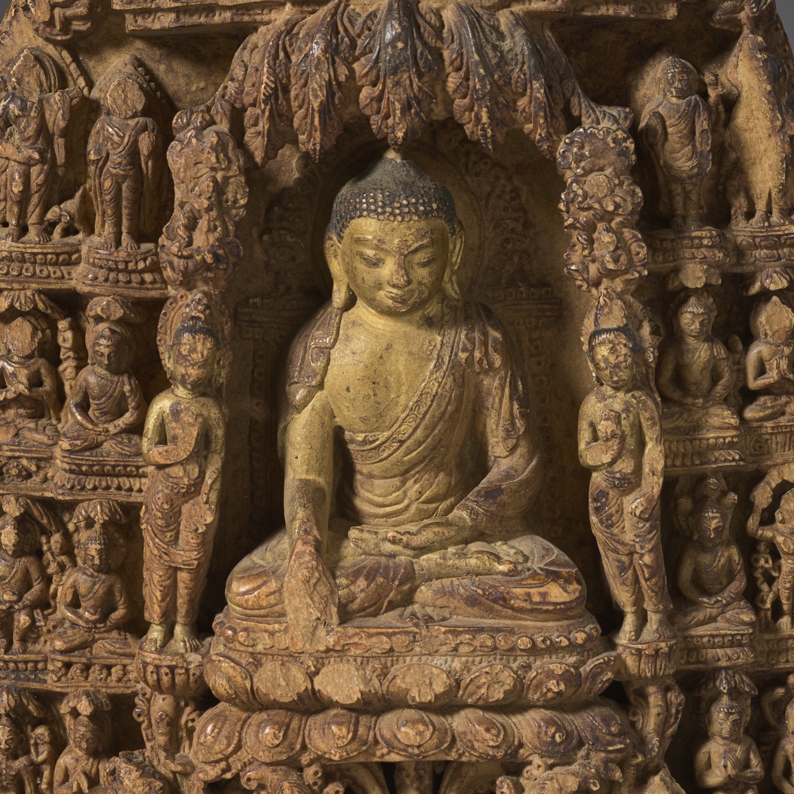 Detail of The central figure on this stele depicts the pivotal moment when Buddha triumphed over Mara, just before attaining enlightenment. 