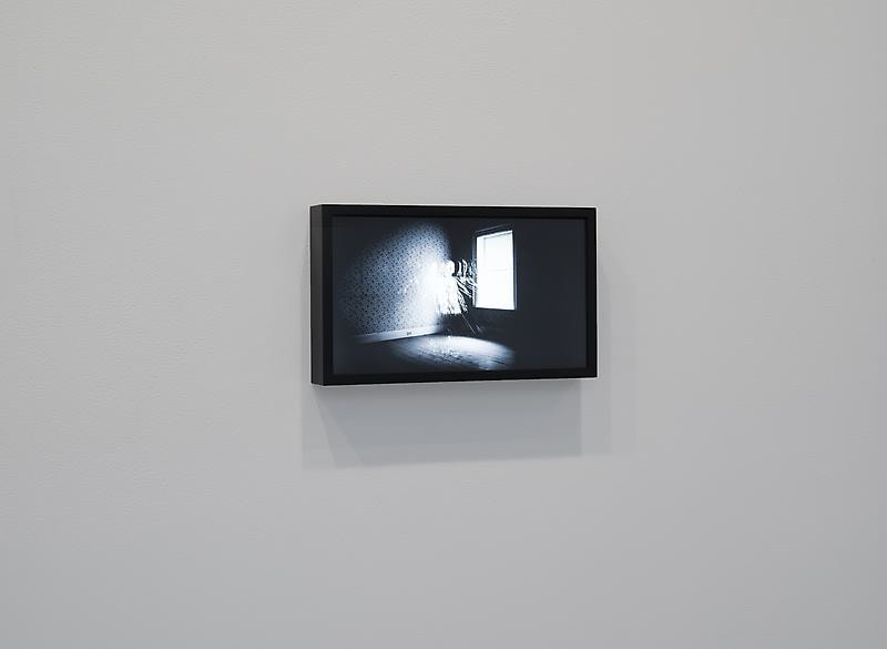 small screen showing a video