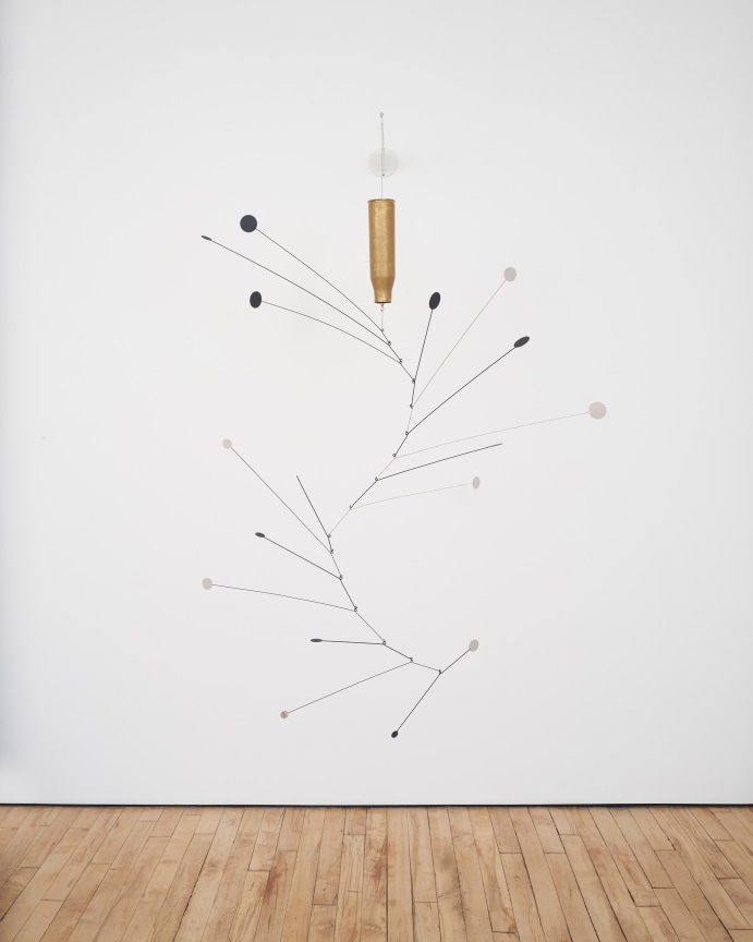 Image of a Tuan Andrew Nguyen brass artillery shell piece.