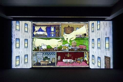 hands emerging from the interior of a dollhouse trying to reach each other