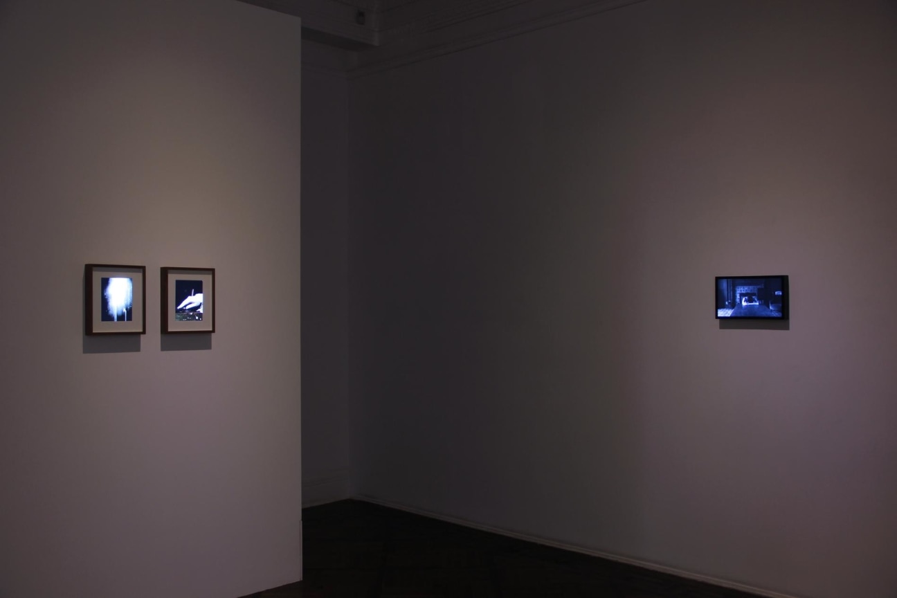 small video screens hanging from the walls