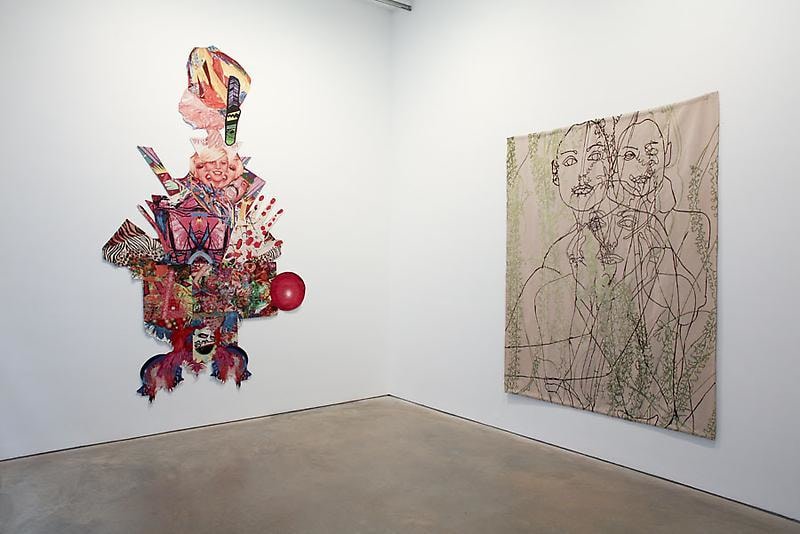 installation view of two tapestries