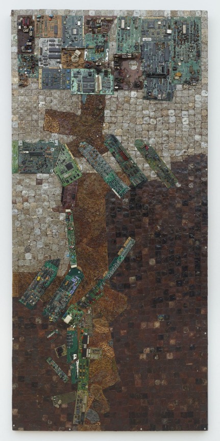 Abstract assemblage composed of flattened bottle caps, motherboard and plastic ants