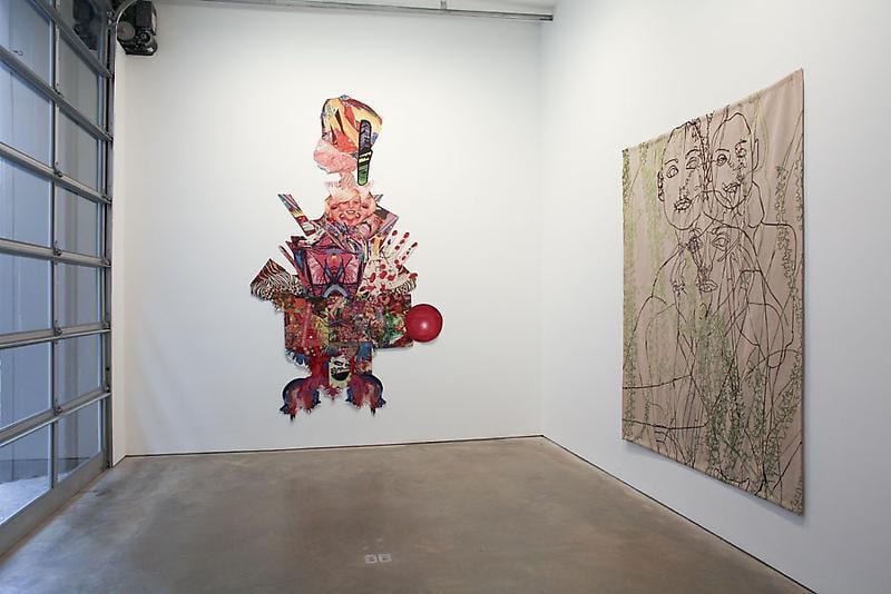 installation view of two tapestries