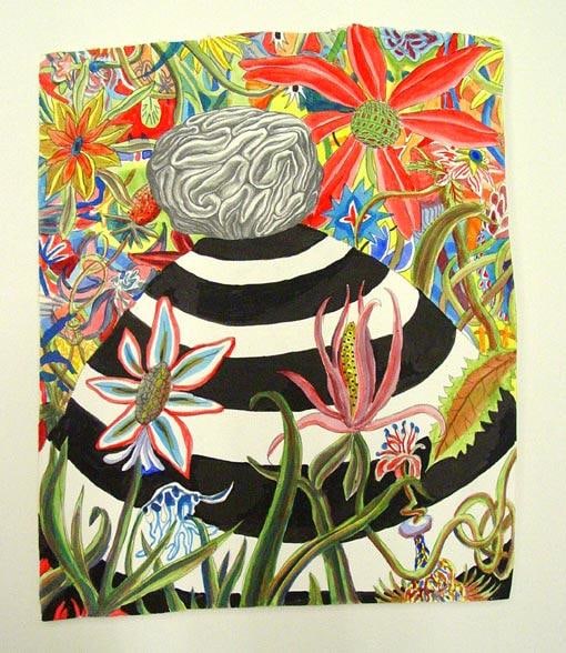 striped mound surrounded by flowers