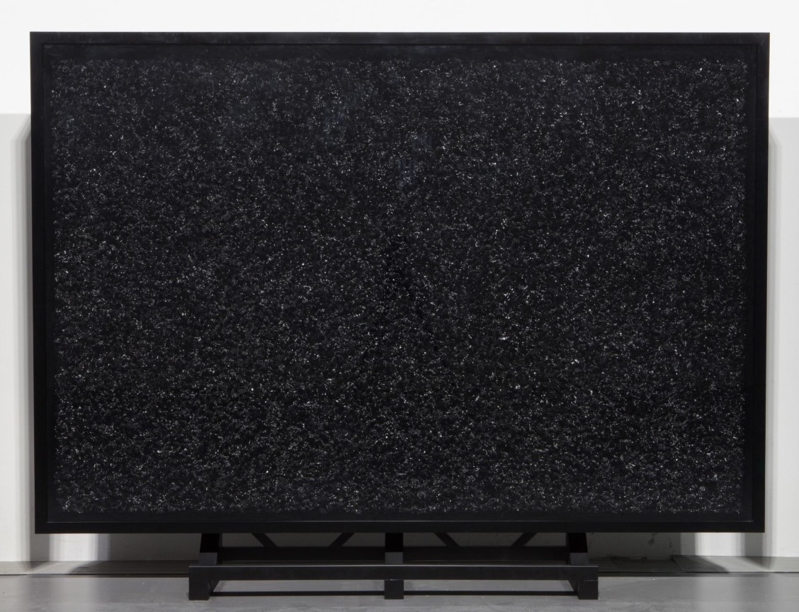 Series of black whipped-cream-like dollops made of oil paint on canvas