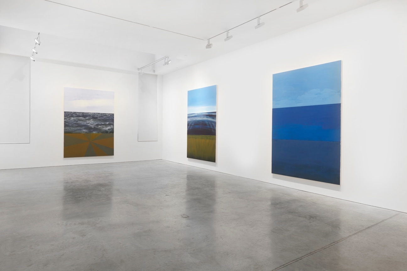 view of three paintings