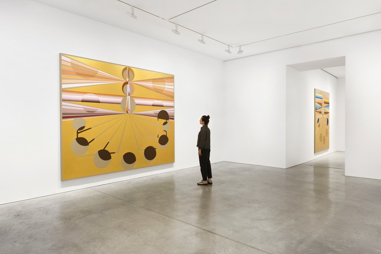 person looking at a painting