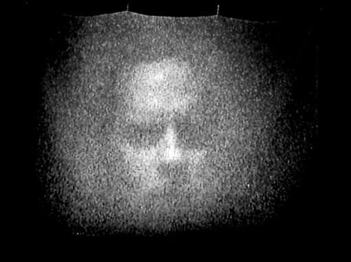 blurry silhouette of a person's face