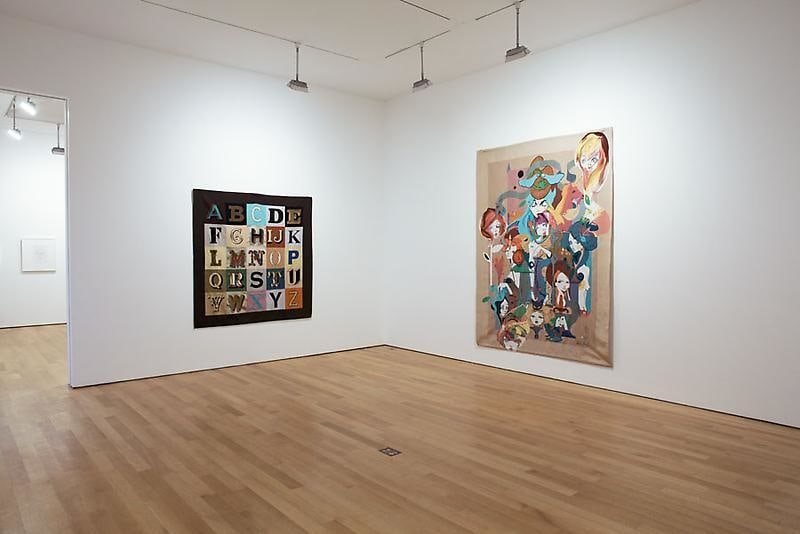 installation view of two tapestries