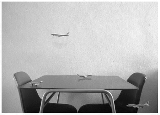 tiny airplanes flying around a dining area