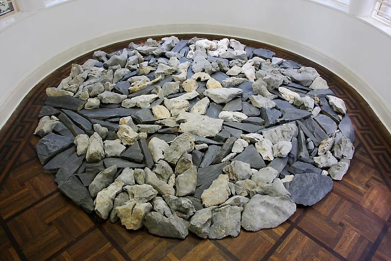 rocks on the floor piled together in a circle