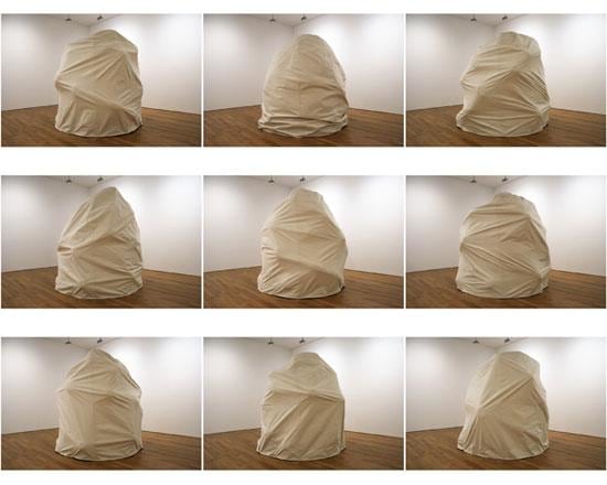 giant object covered in canvas