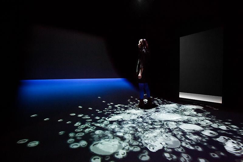 video projection on the floor of bubbles