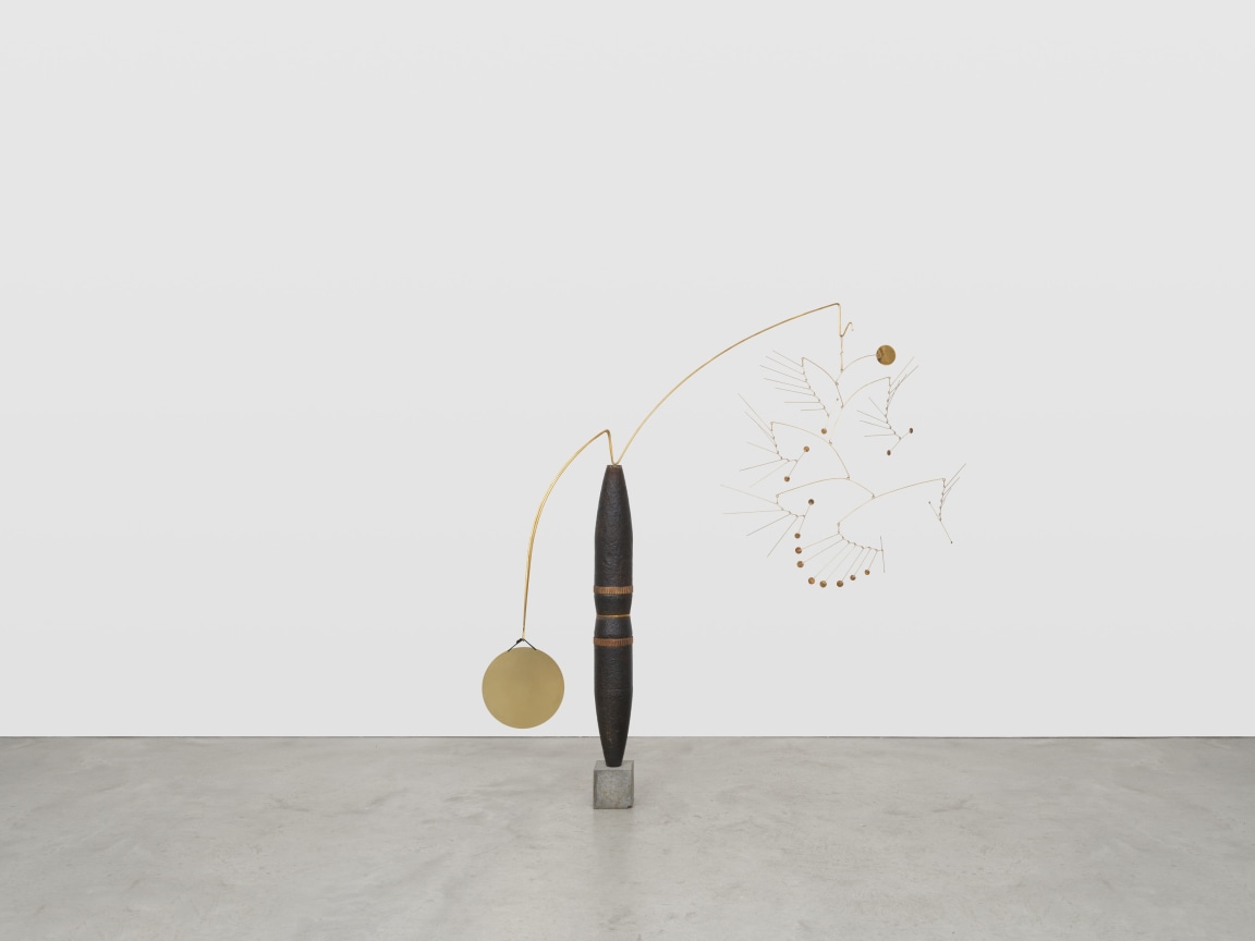 Circle Burst, 2024, 155mm artillery shells, brass from artillery shell, brass from pounded artillery shells, powder coat, concrete, bell tuned to G3, 192.43 Hz