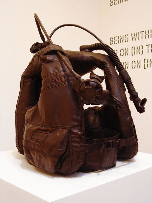 bronze sculpture of a diving vest