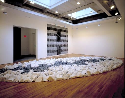 rocks organized in the shape of an oval on the floor