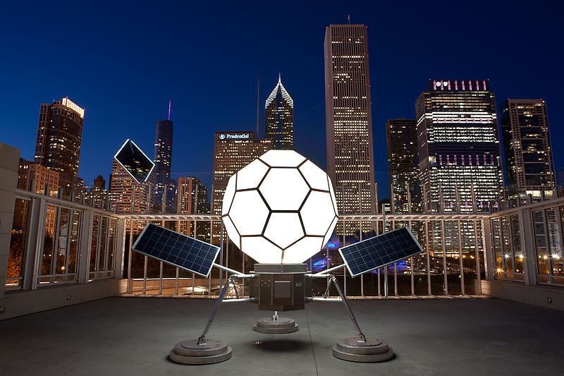 Two solar panels with charger, light-emitting diodes, and lamp fixture, lead, aluminum, stainless steel, and polycarbonate 11' 4&quot; x 16' 8&quot; x 11' 6&quot;