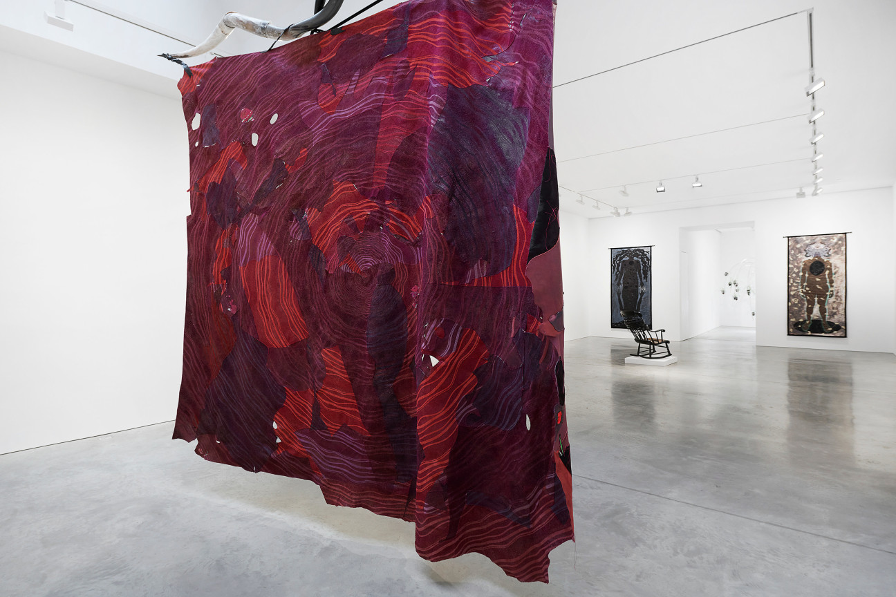 large red fabric hanging from the ceiling