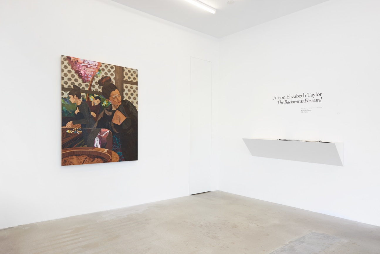 installation view of one artwork next to the exhibition vinyl