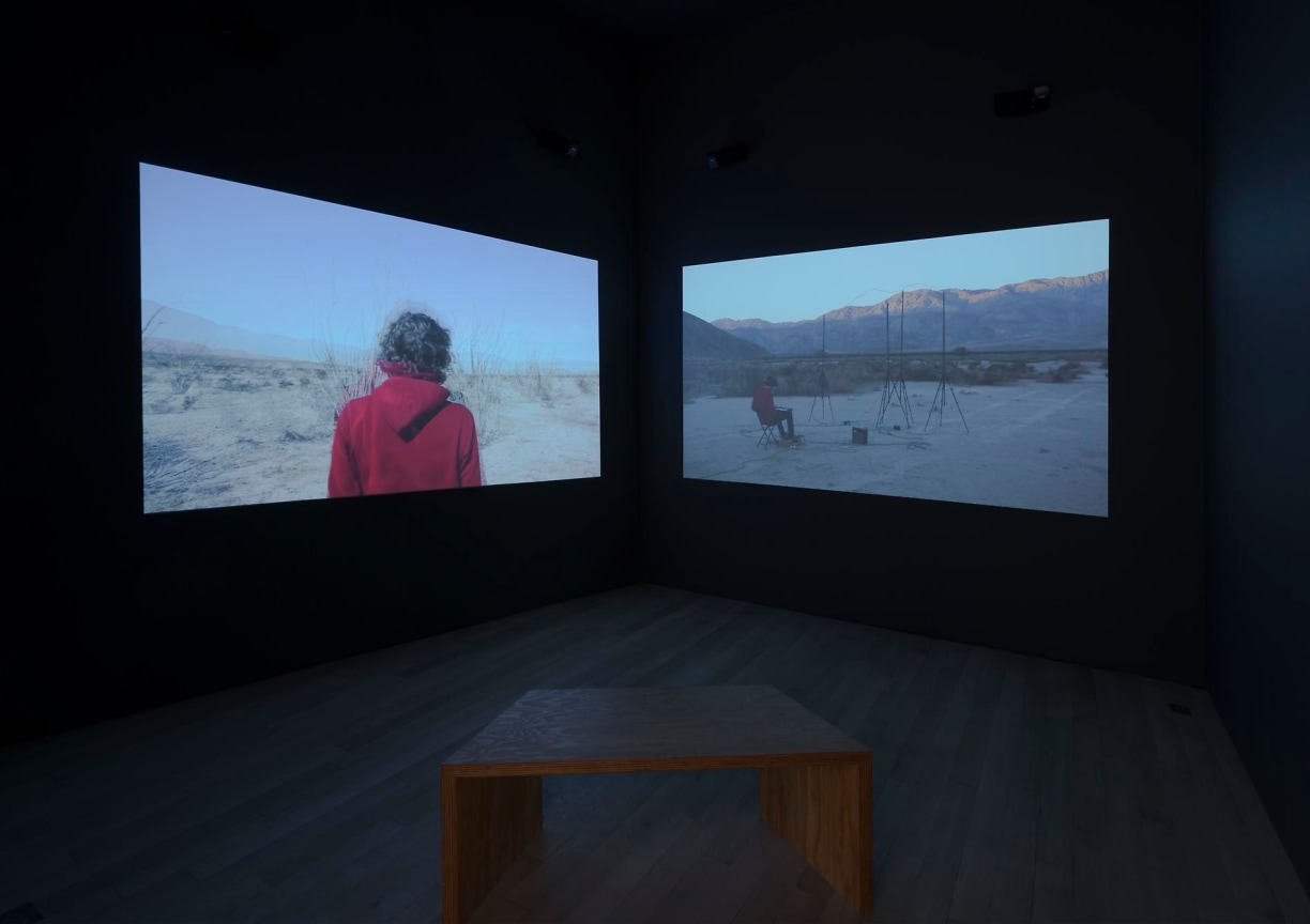 dark room with two video projections