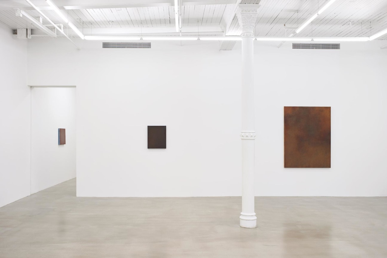 Installation view of three artworks