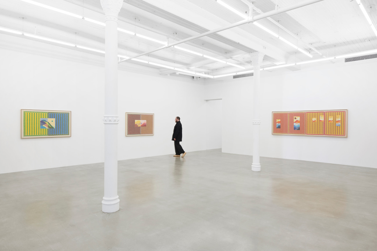 figure moving through gallery with three embroidered artworks