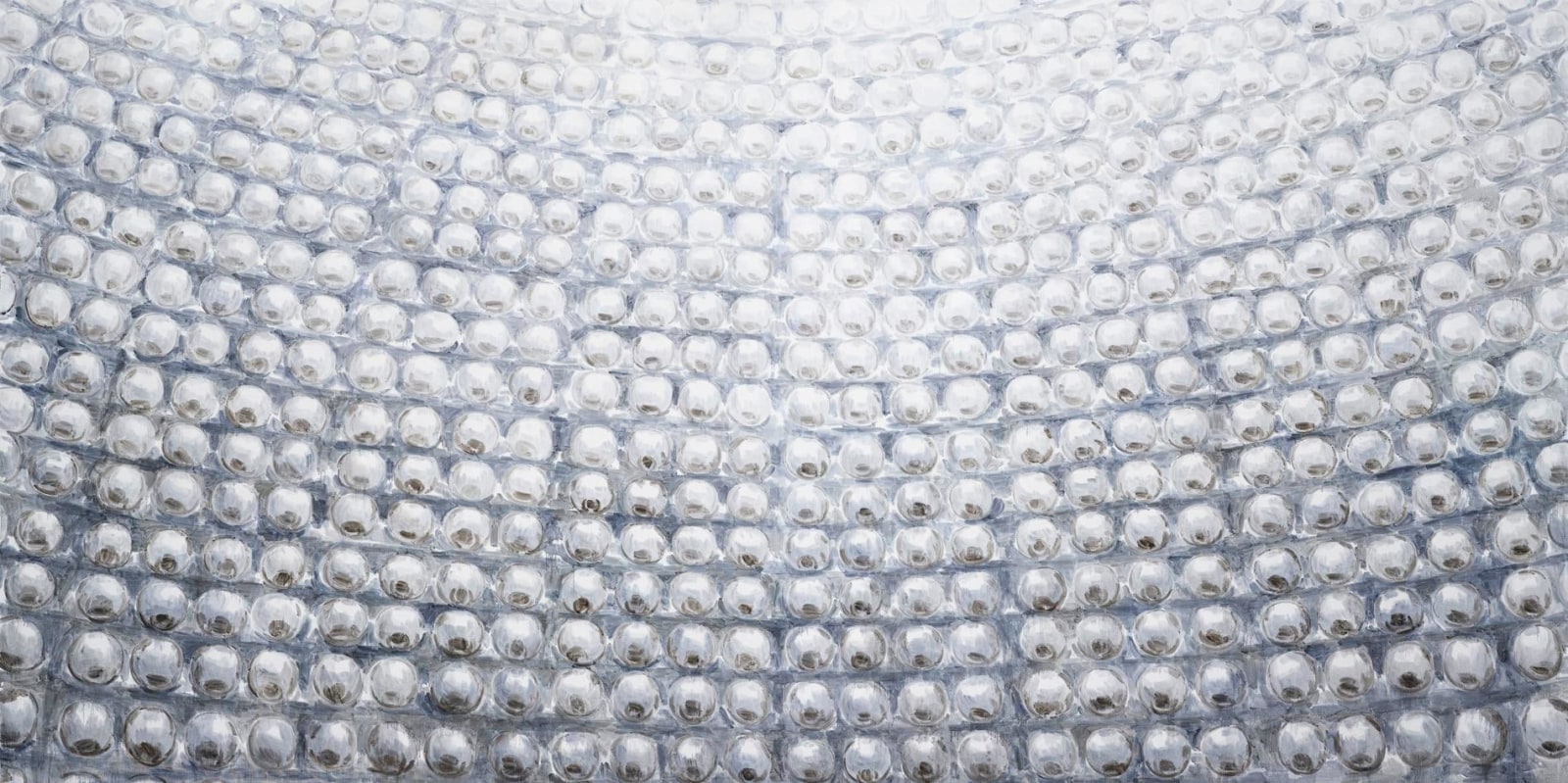 hundreds of white beads lines up and painted into one canvas