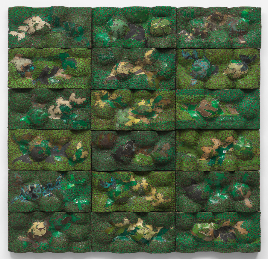 electrical wires and motherboard imitating mounds of grass and dirt