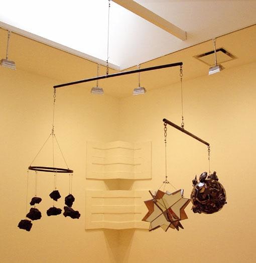 a mobile with rocks and other random objects