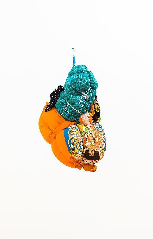 bundle of cloth hanging from the ceiling