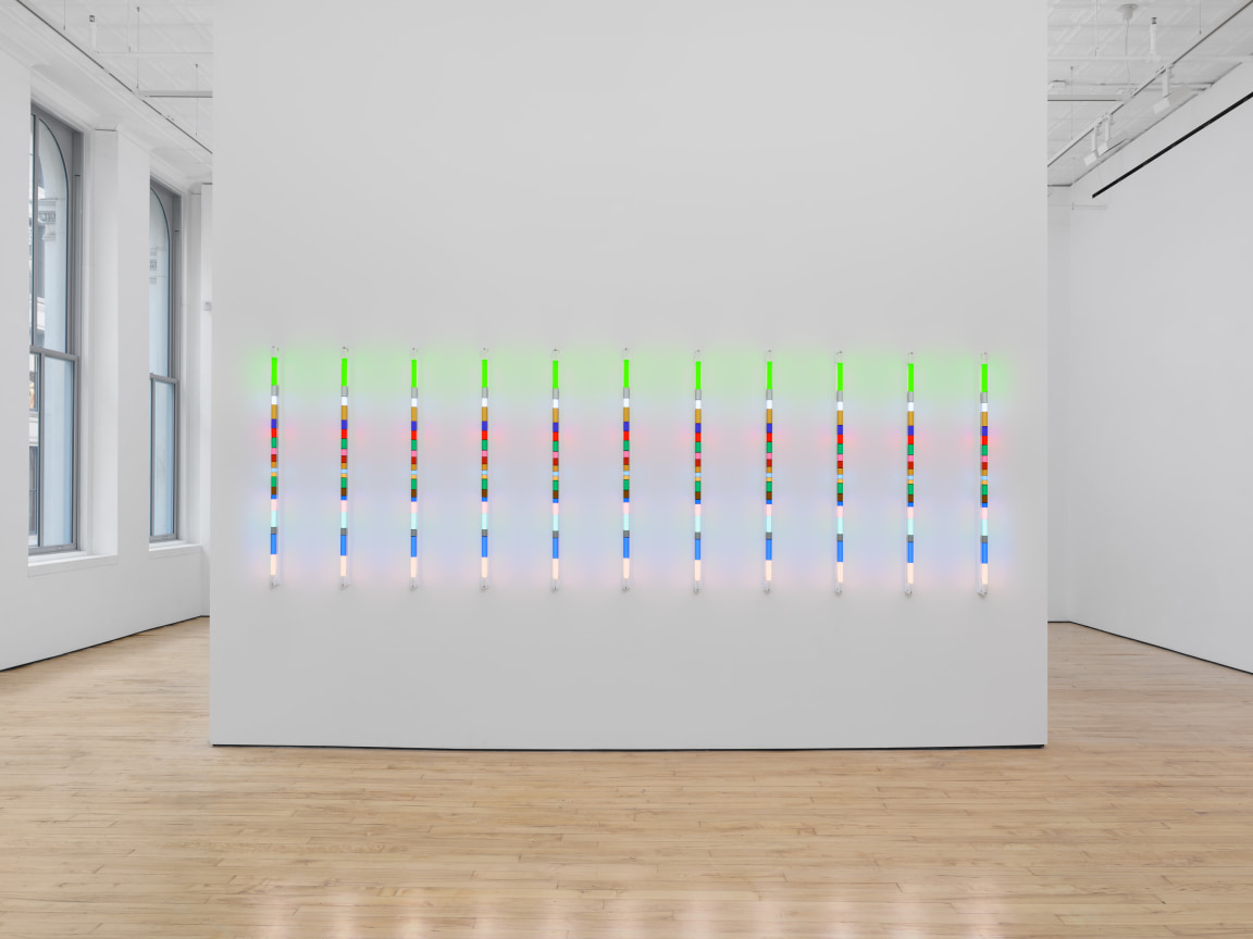 Series of colorful LED lights installed on a white wall