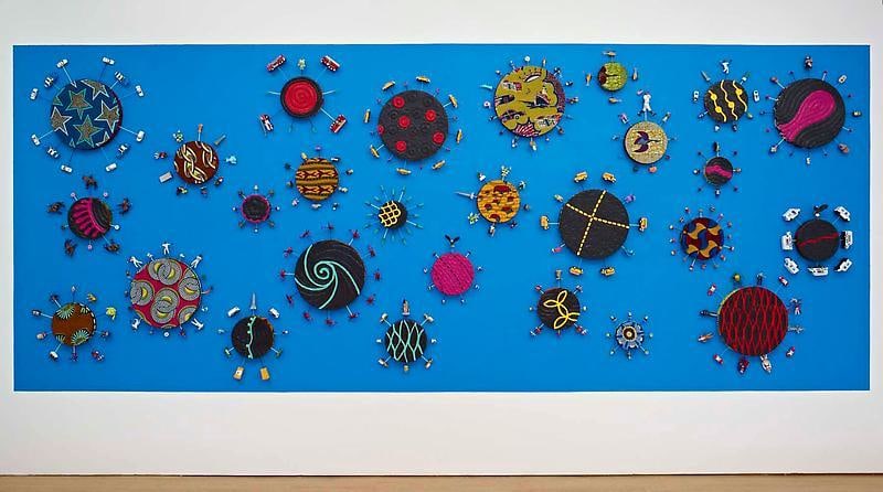 multiple circles surrounded by toy cars