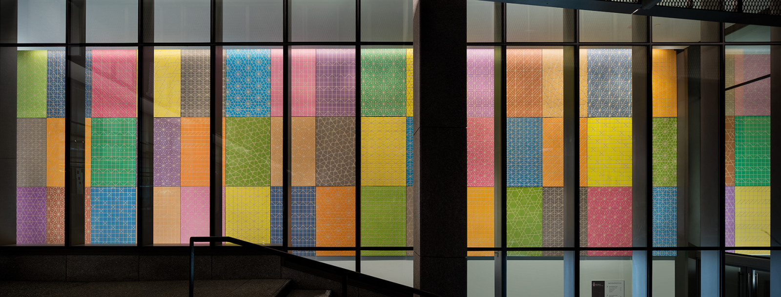 Plywood paneling, fretted glass, ceramic tile, wood and porcelain flooring, and concrete pavers within Brown University Building