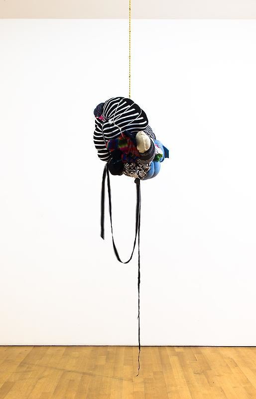 bundle of cloth hanging from the ceiling