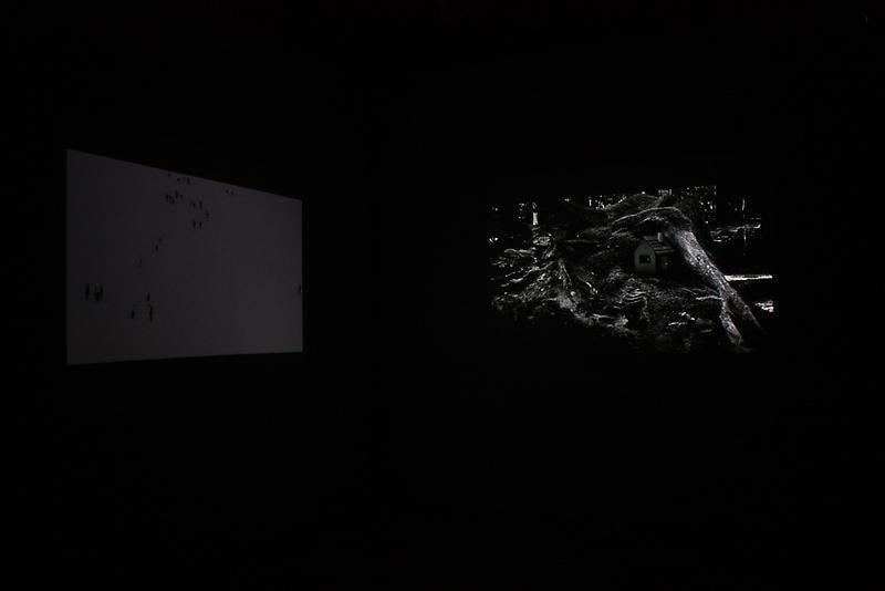 larger video recording shown in a dark room