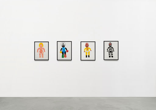 a row of colored artworks of action figures