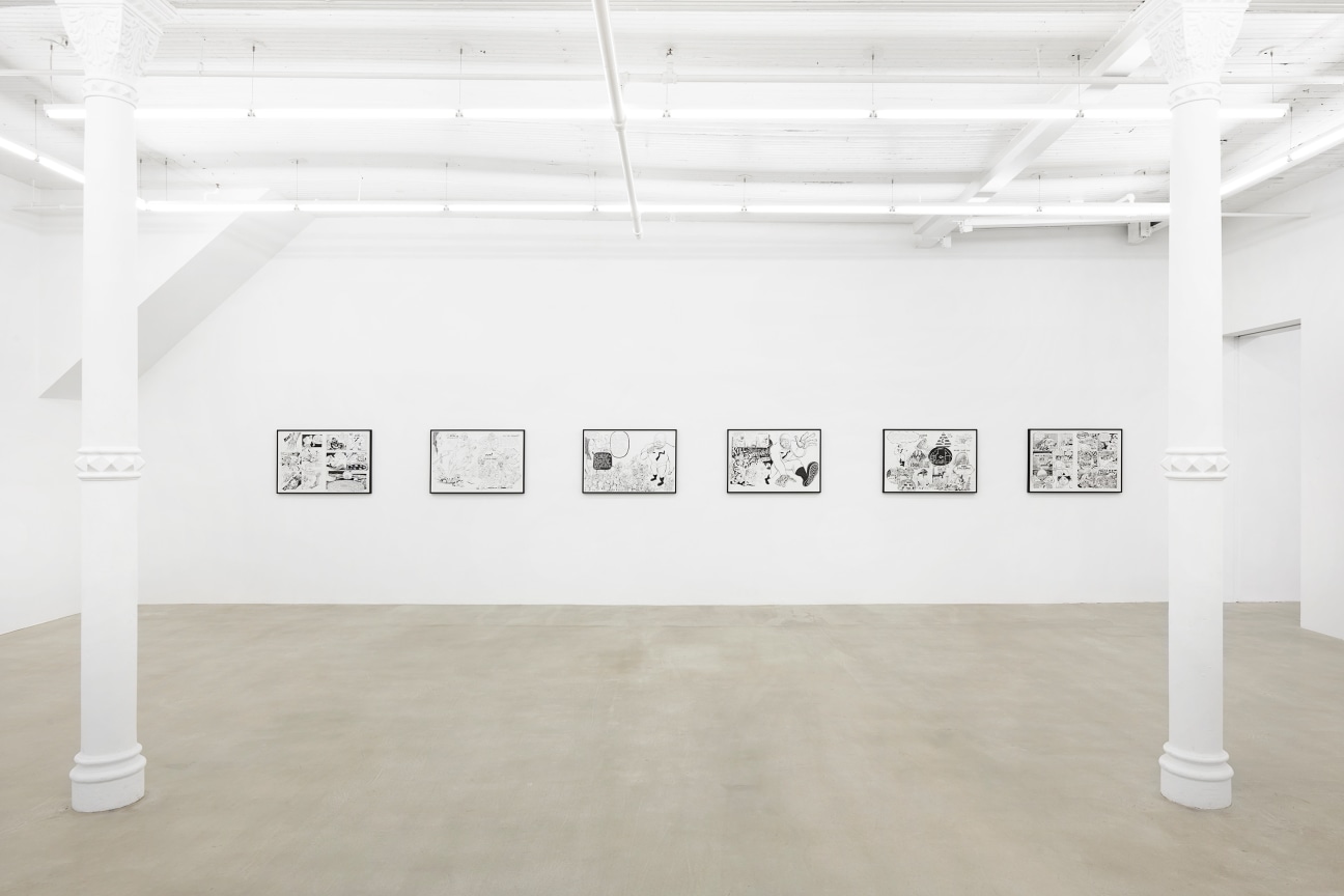 a row of black and white artworks