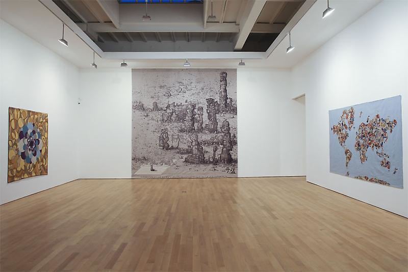 installation view of three tapestries