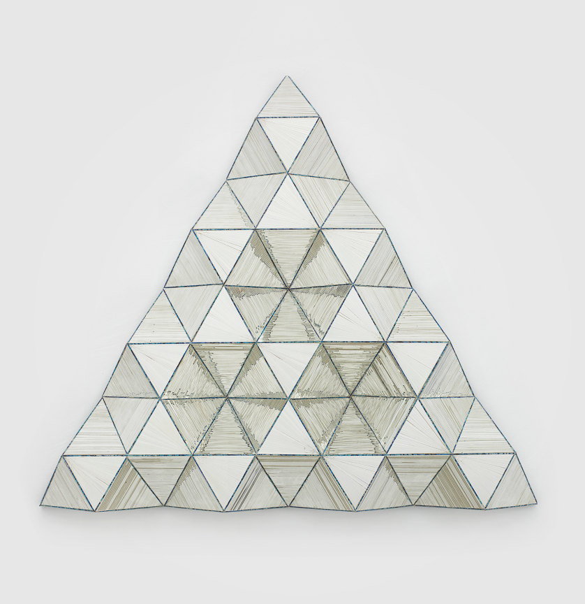 Reverse Painted Mirrored Glass in the shape of a triangle