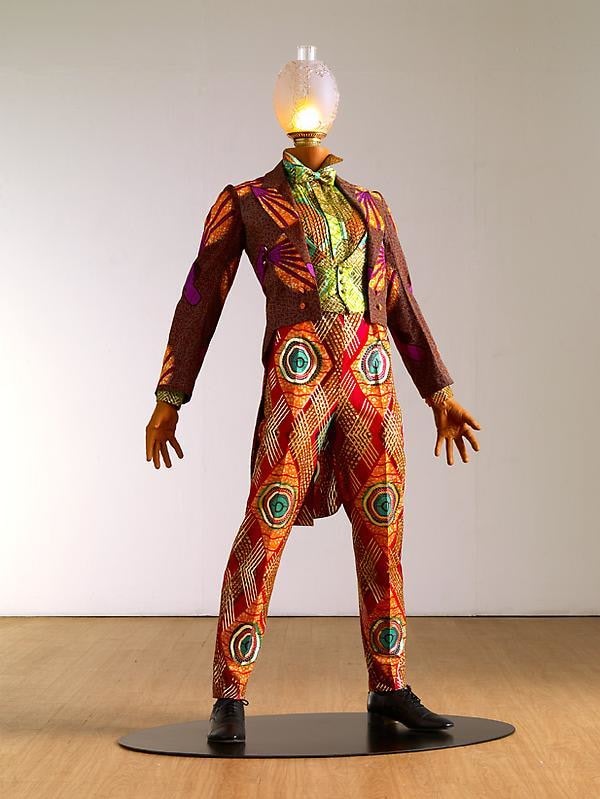 mannequin with a lamp for a head