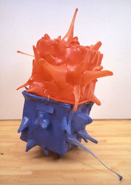 two cube-like structures splattering outwards