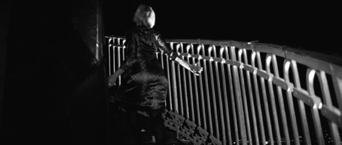 woman going up a set of stairs